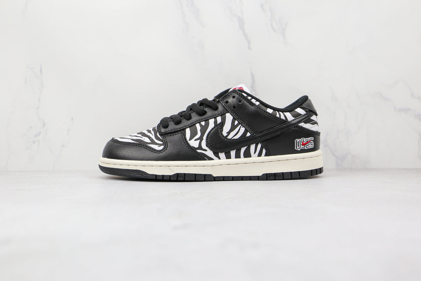 Nike SB Dunk Low Quartersnacks Zebra